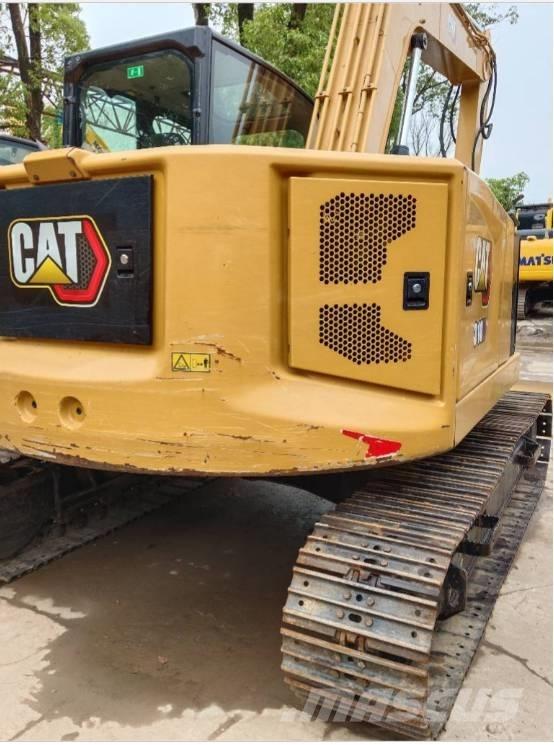 CAT 310 Bagri goseničarji