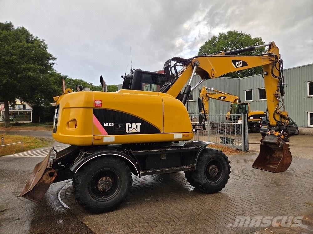 CAT M313D Bagri na kolesih