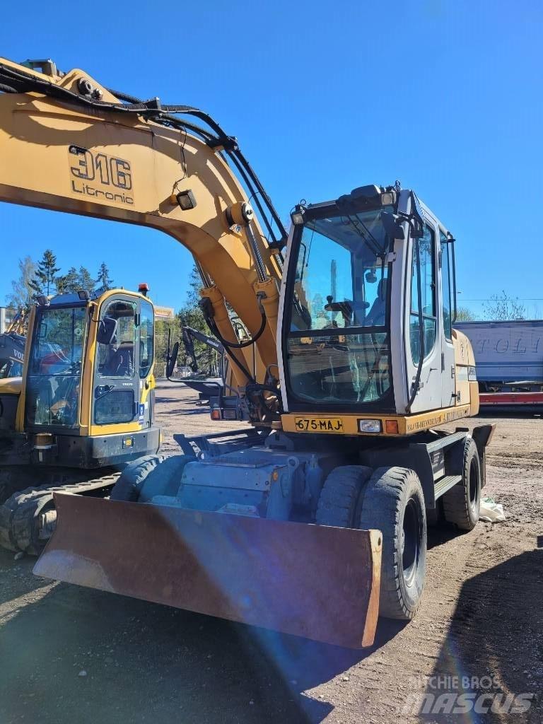 Liebherr 316 Bagri na kolesih