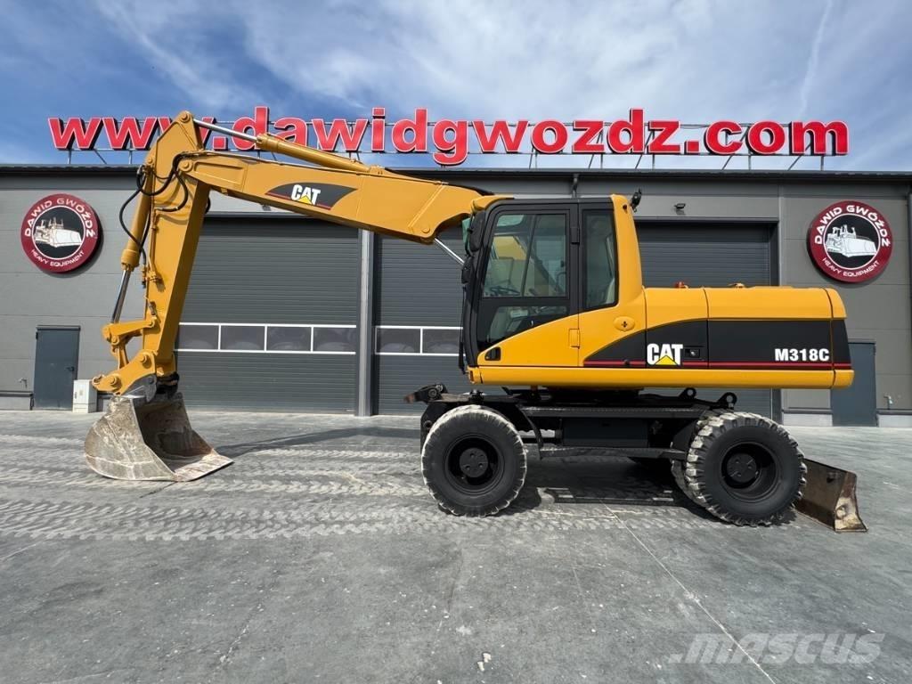 CAT M 318 C Bagri na kolesih