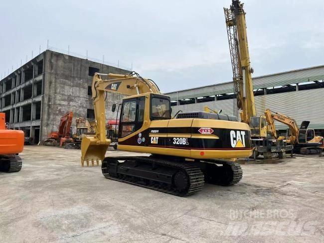 CAT 320 BL Bagri goseničarji