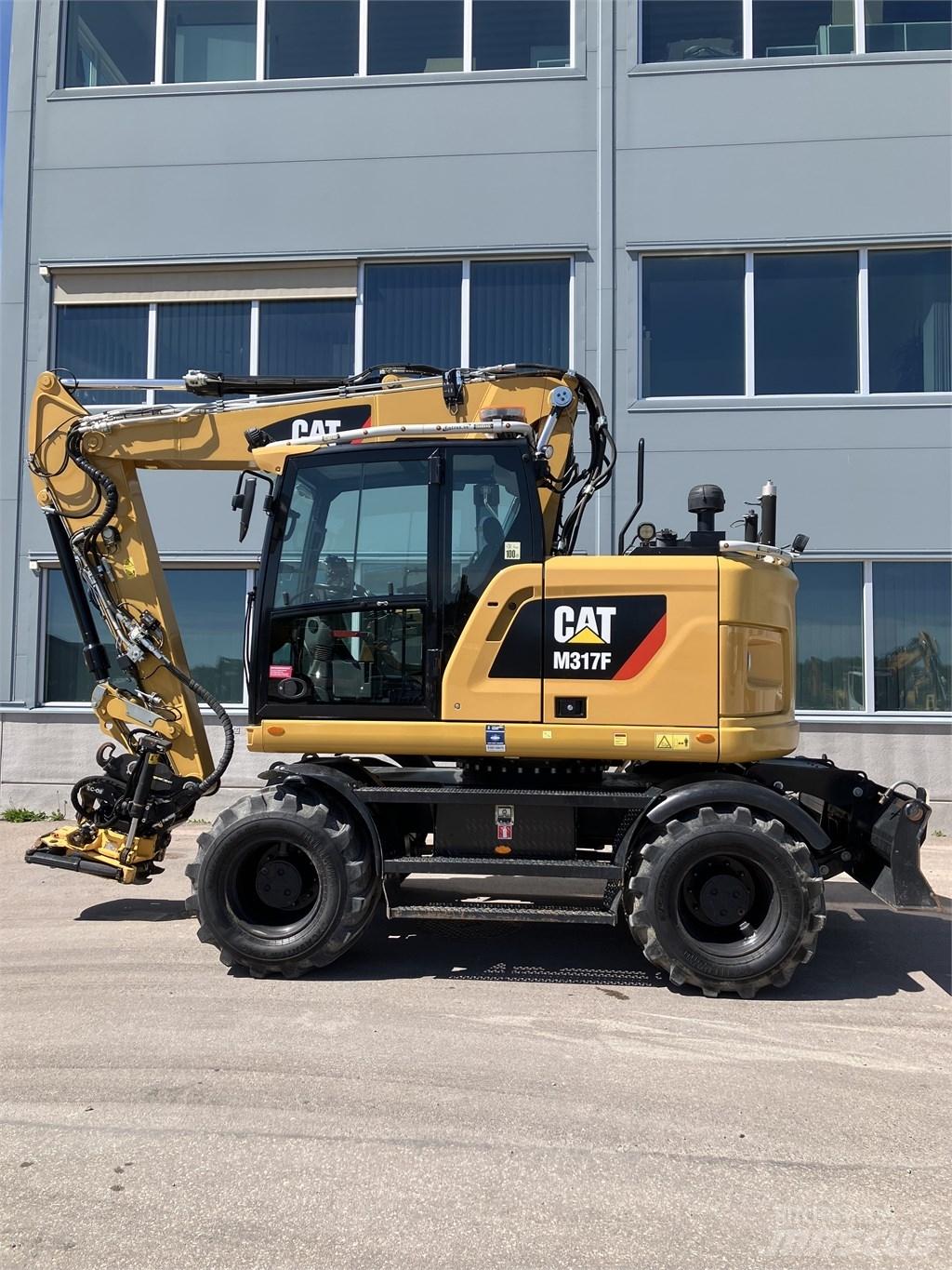 CAT 317 F Bagri na kolesih