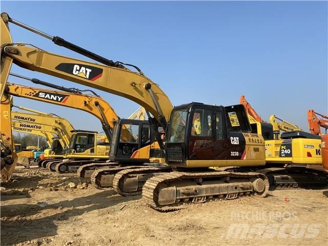 CAT 323D Bagri goseničarji