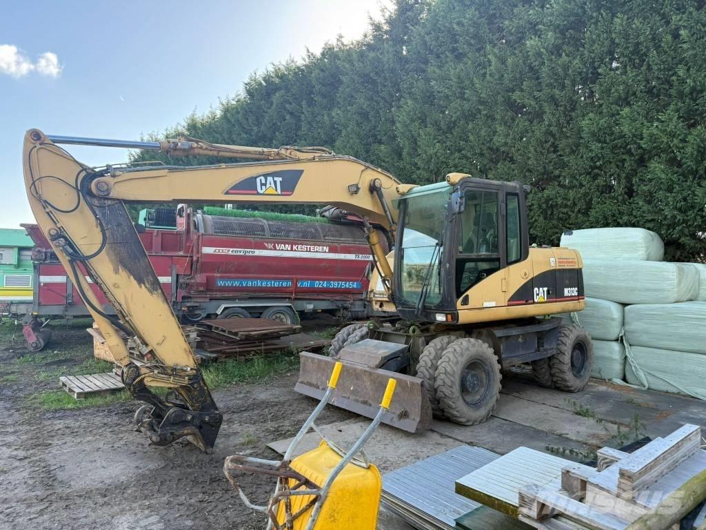 CAT M 313 C Bagri na kolesih