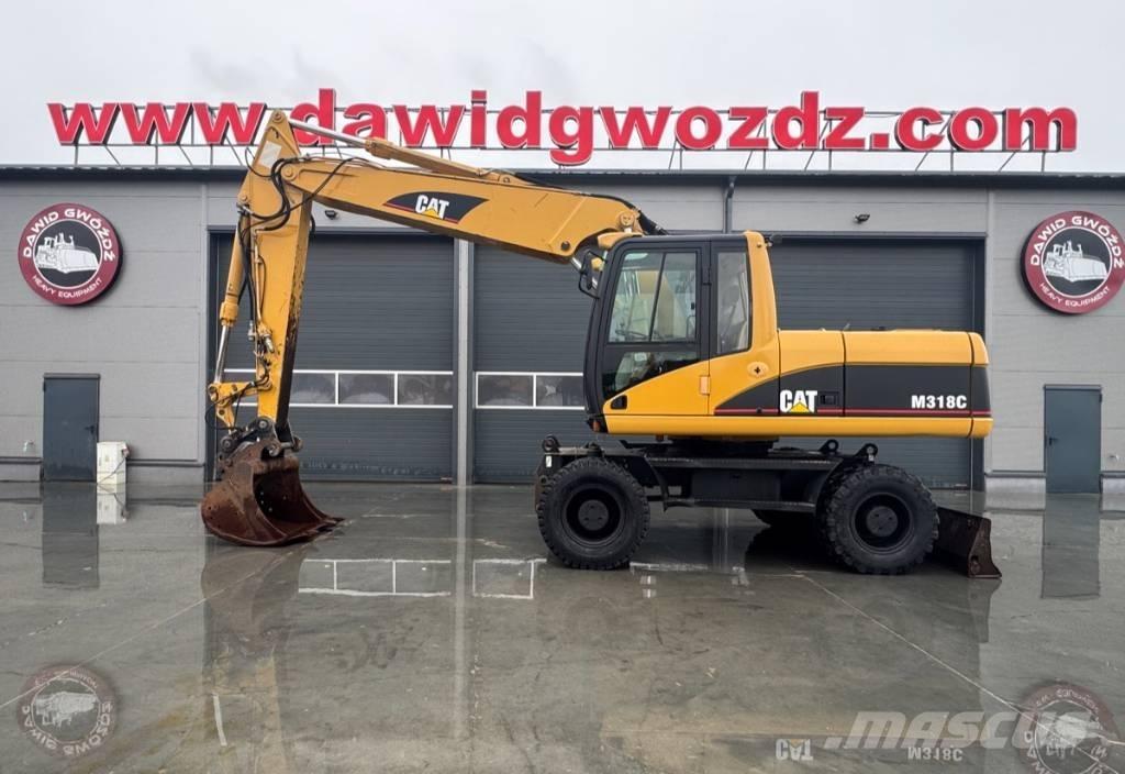 CAT M 318 C Bagri na kolesih
