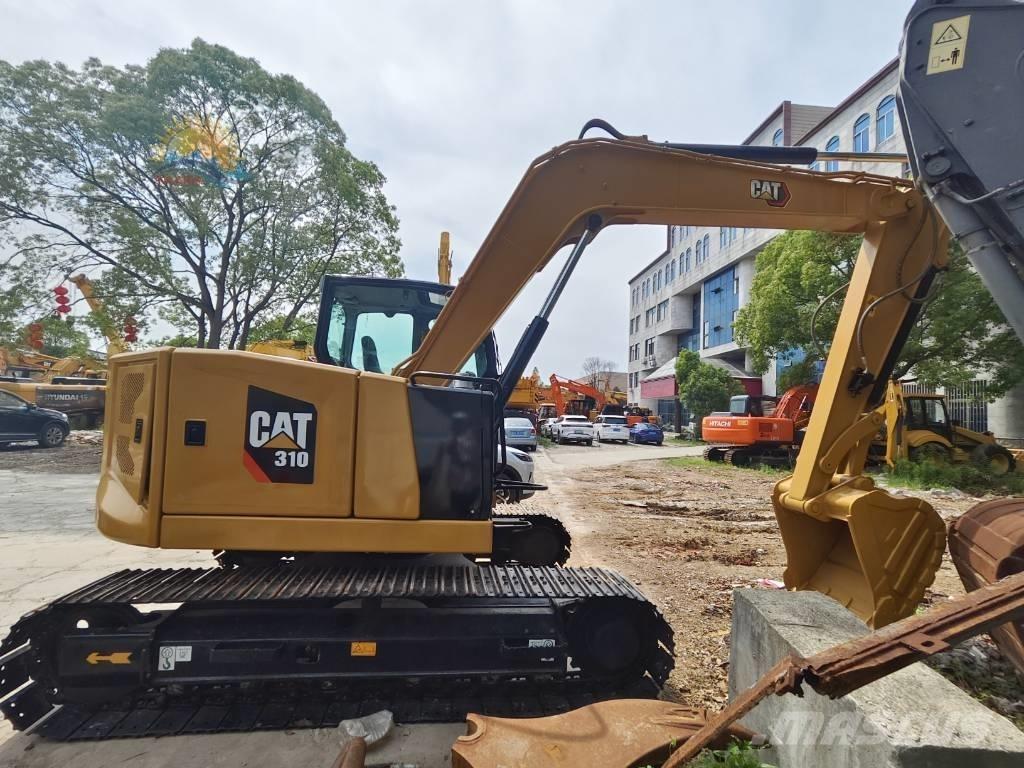 CAT 310 Bagri goseničarji