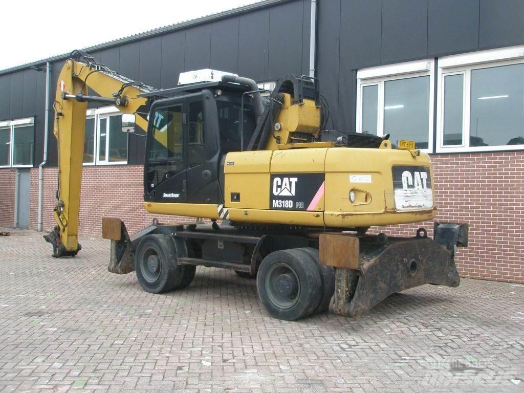 CAT M318D Bagri na kolesih