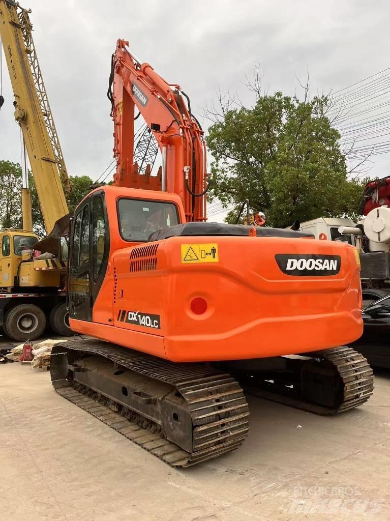 Doosan DX 140 Bagri goseničarji