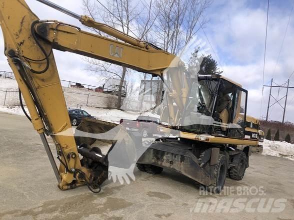 CAT M318 Bagri na kolesih