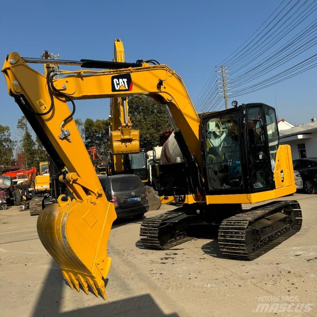 CAT 310 Bagri goseničarji