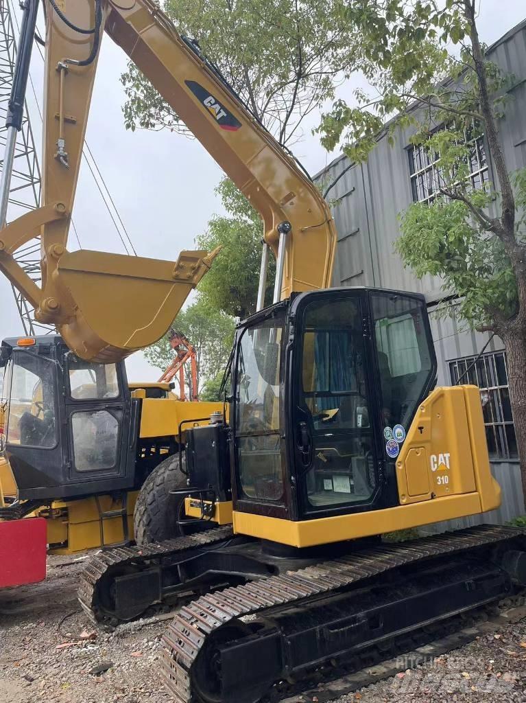 CAT 310 Bagri goseničarji