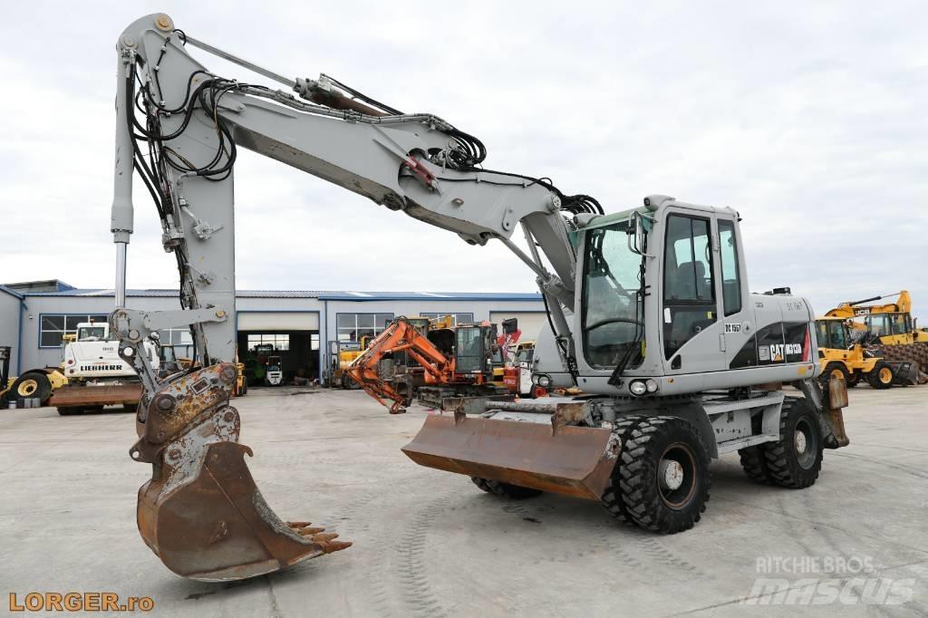 CAT M 313 D Bagri na kolesih