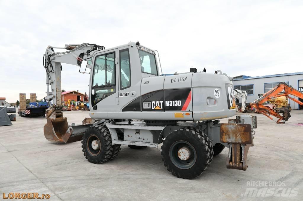 CAT M 313 D Bagri na kolesih