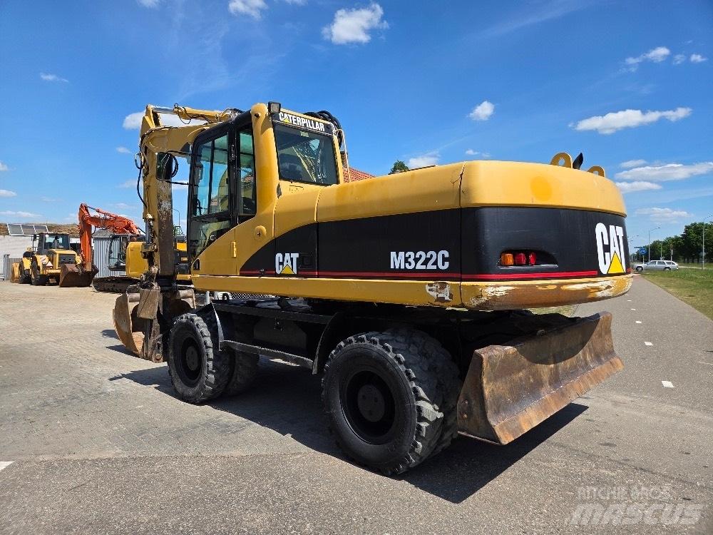 CAT M322C Bagri na kolesih