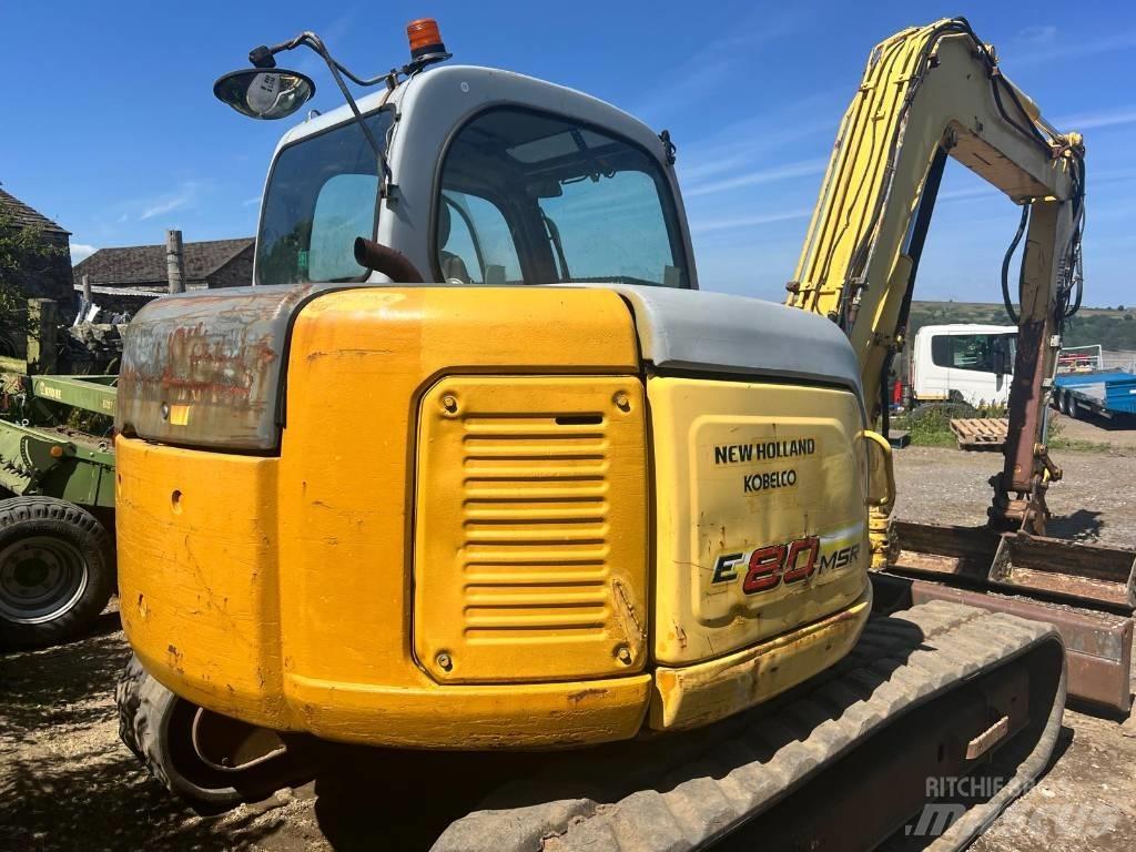 New Holland E 80 Midi bagri 7t – 12t