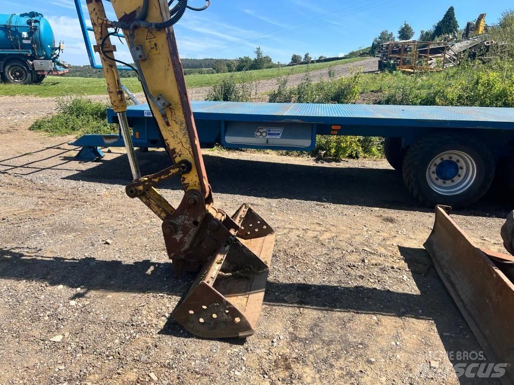New Holland E 80 Midi bagri 7t – 12t