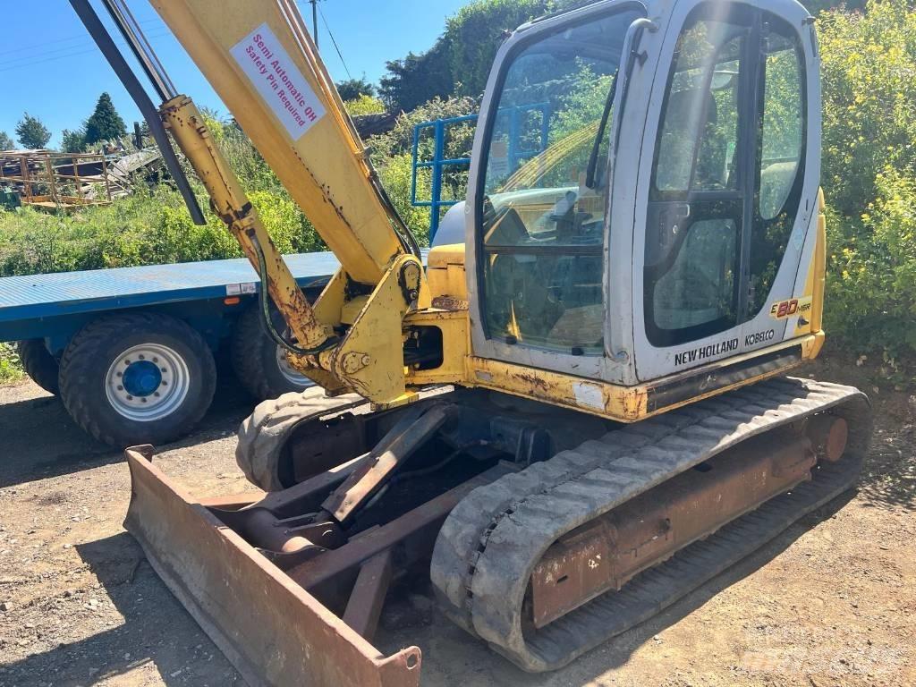 New Holland E 80 Midi bagri 7t – 12t