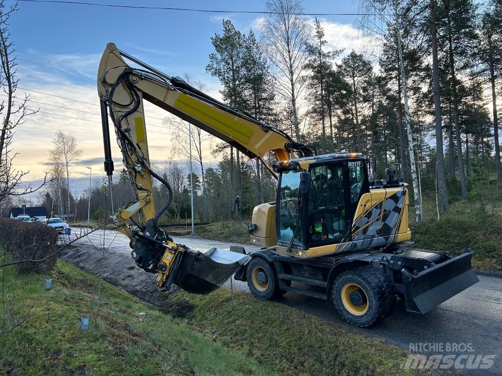 CAT M 317F Bagri na kolesih