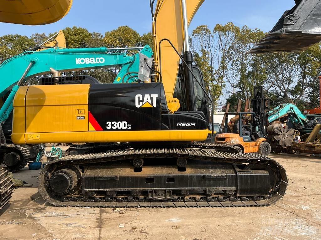 CAT 330 Bagri goseničarji