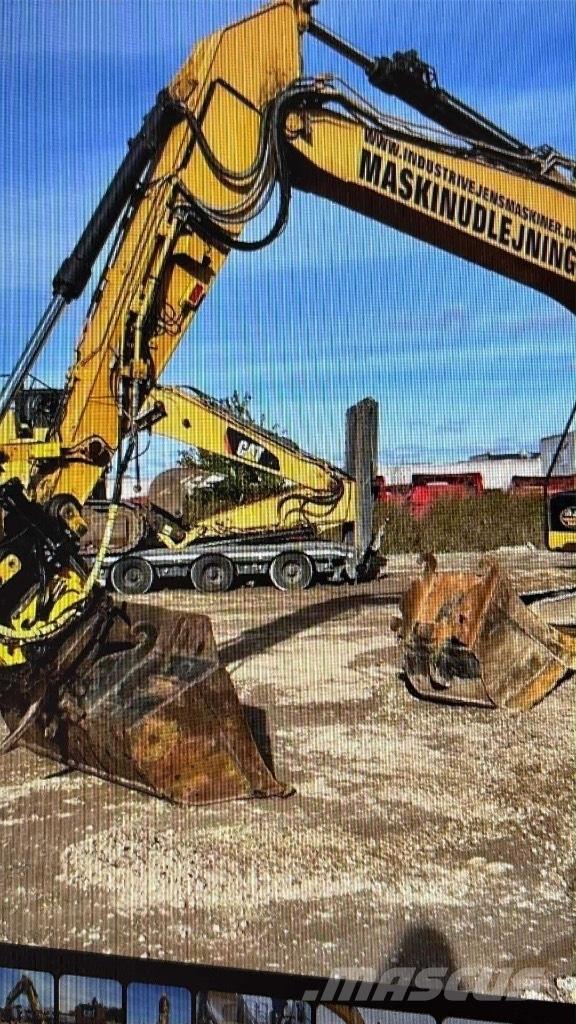 CAT M315F Bagri na kolesih