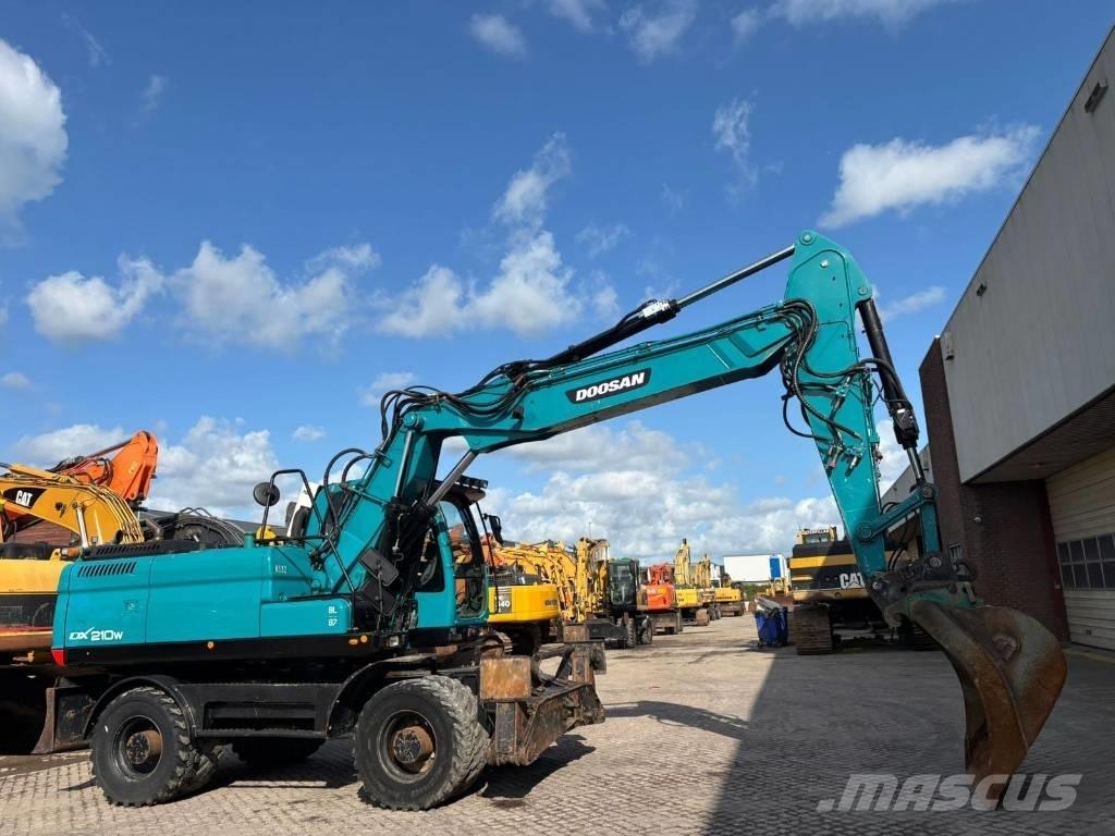 Doosan DX 210 W Bagri na kolesih