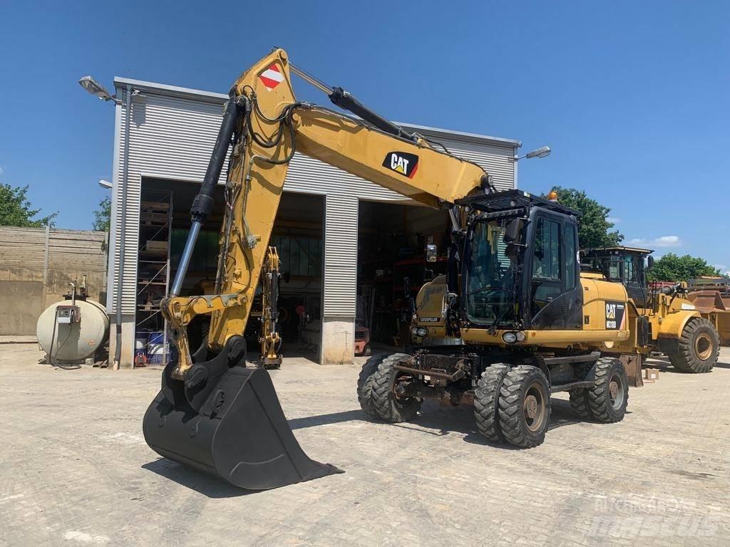 CAT M 318 D Bagri na kolesih
