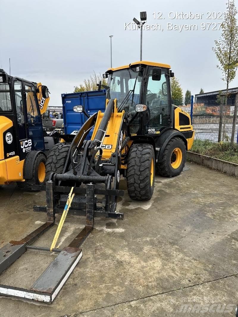 JCB 409 Kolesni nakladalci