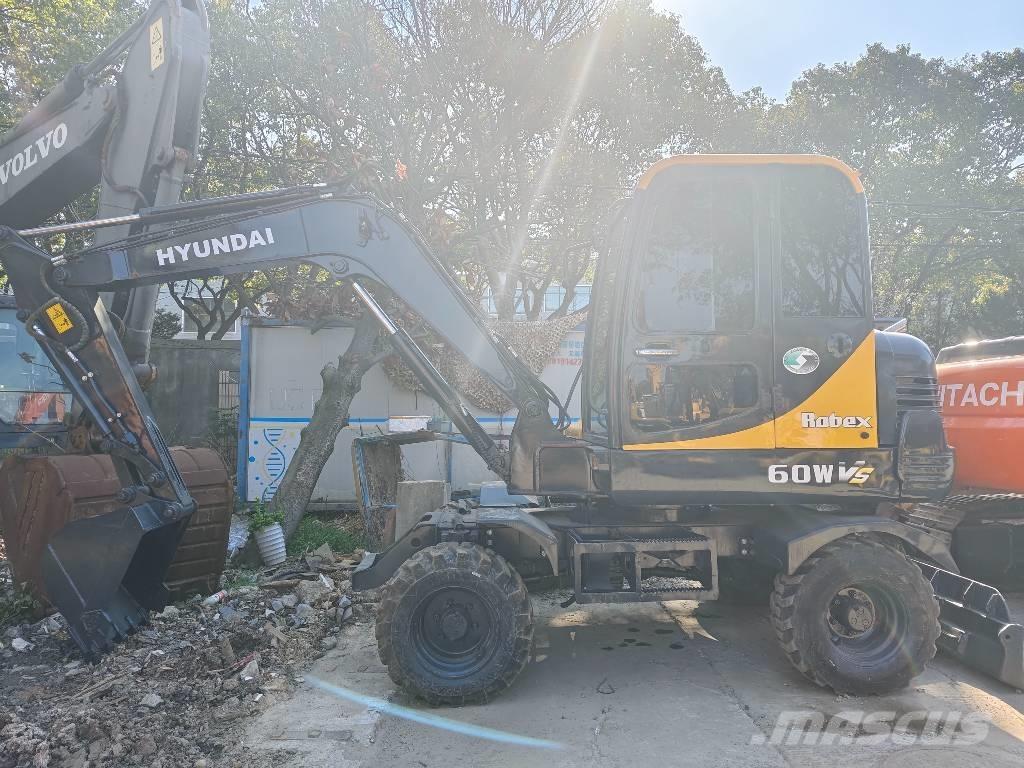 Hyundai 60 W VS Mini bagri <7t