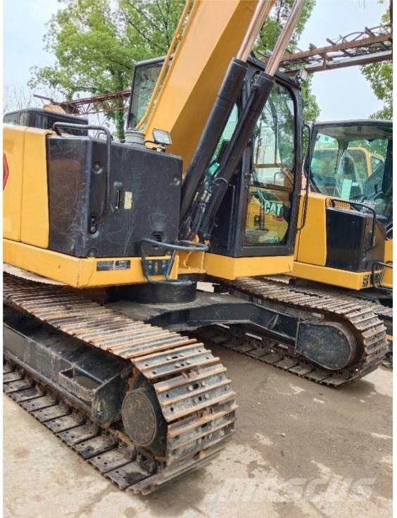 CAT 310 Bagri goseničarji
