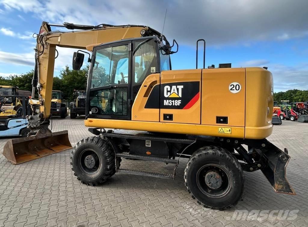 CAT M 318 F Bagri na kolesih