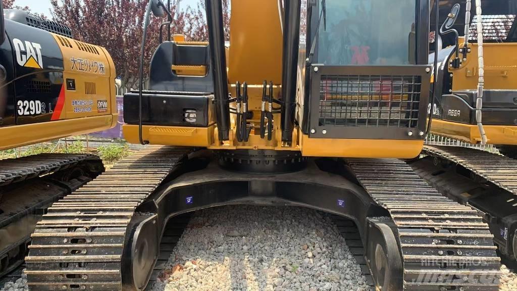 CAT 323 Bagri goseničarji