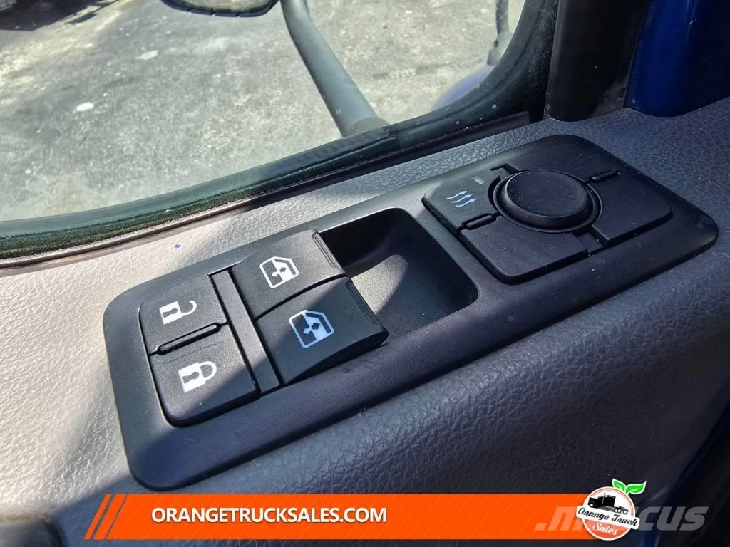 International MV607 Tovornjaki s kesonom/platojem