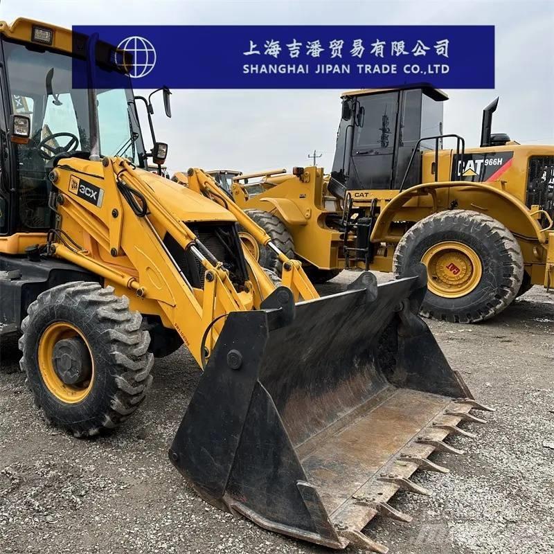 JCB 3 CX Kolesni nakladalci