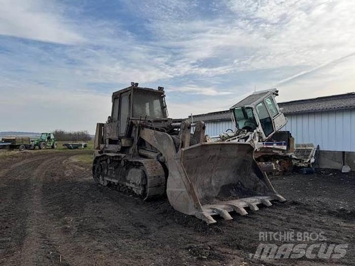 CAT 973C - Kolesni nakladalci