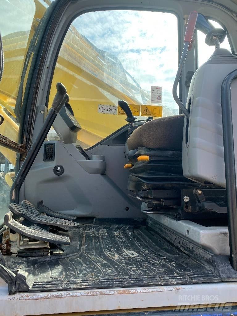 New Holland E 305 Bagri goseničarji