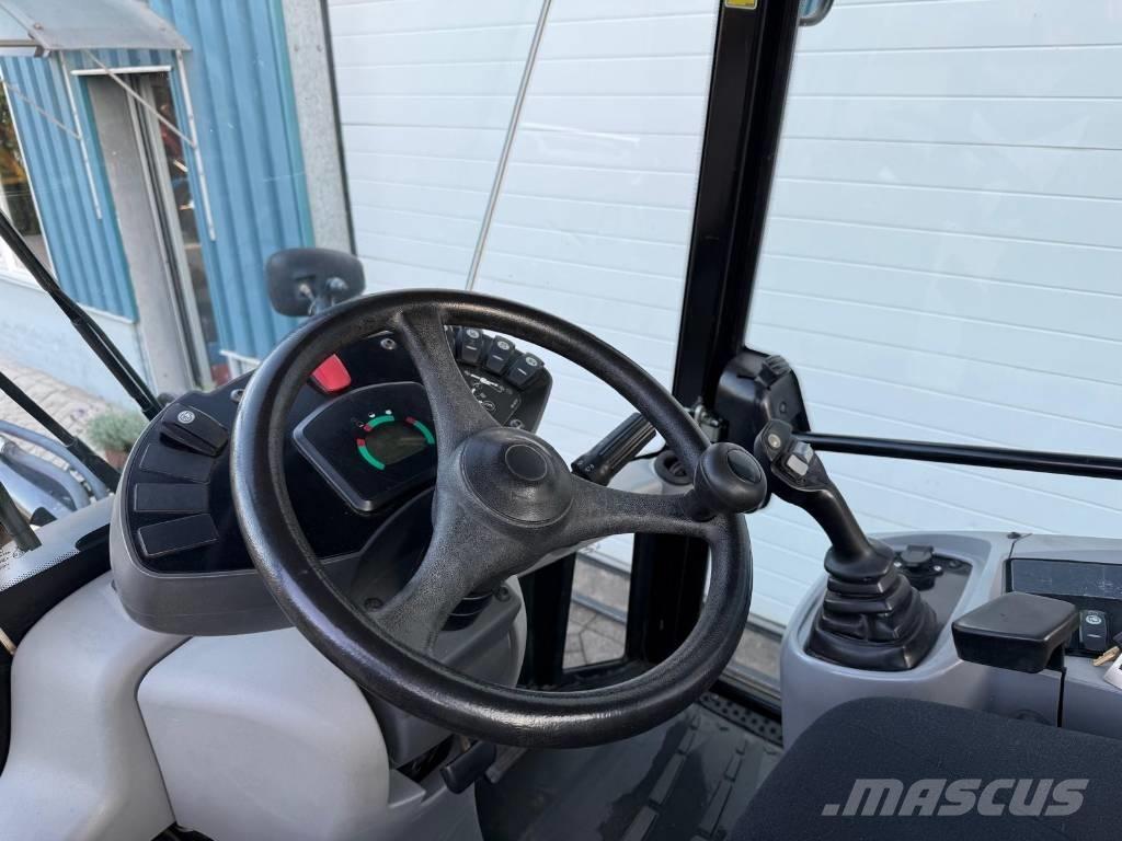 CAT 907 H Kolesni nakladalci