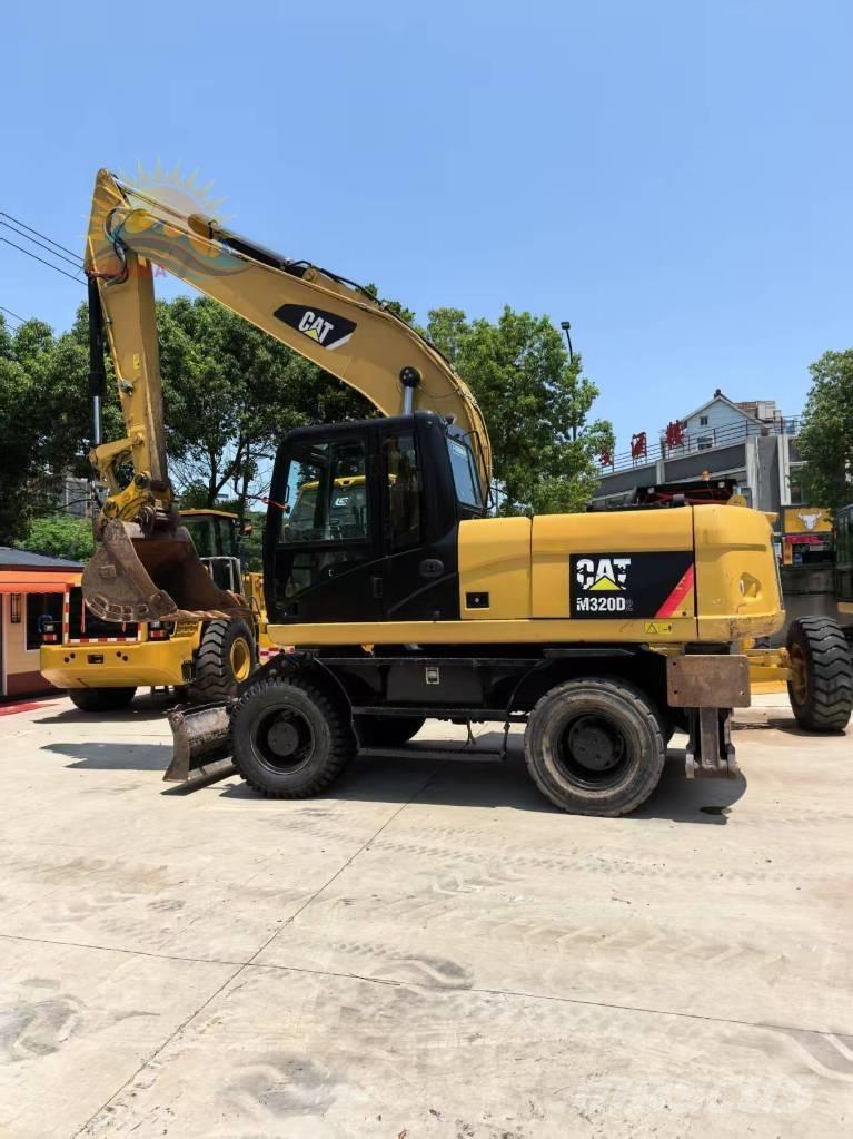 CAT M 320D2 Bagri na kolesih
