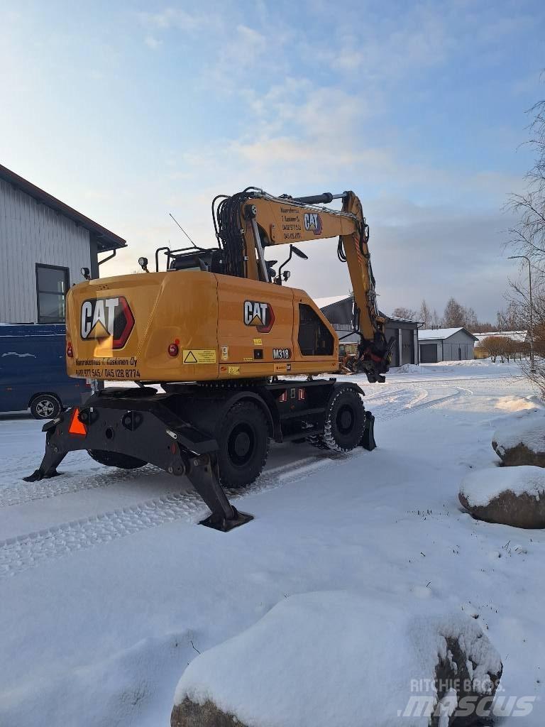 CAT M 318 Bagri na kolesih
