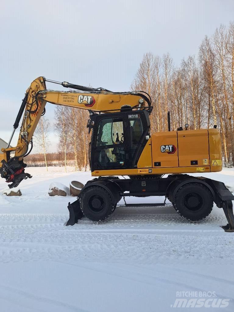 CAT M 318 Bagri na kolesih
