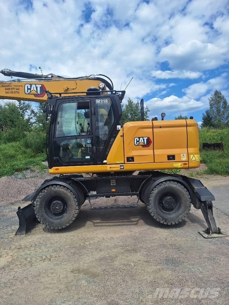 CAT M 318 Bagri na kolesih