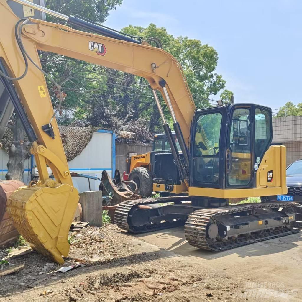 CAT 310 Bagri goseničarji