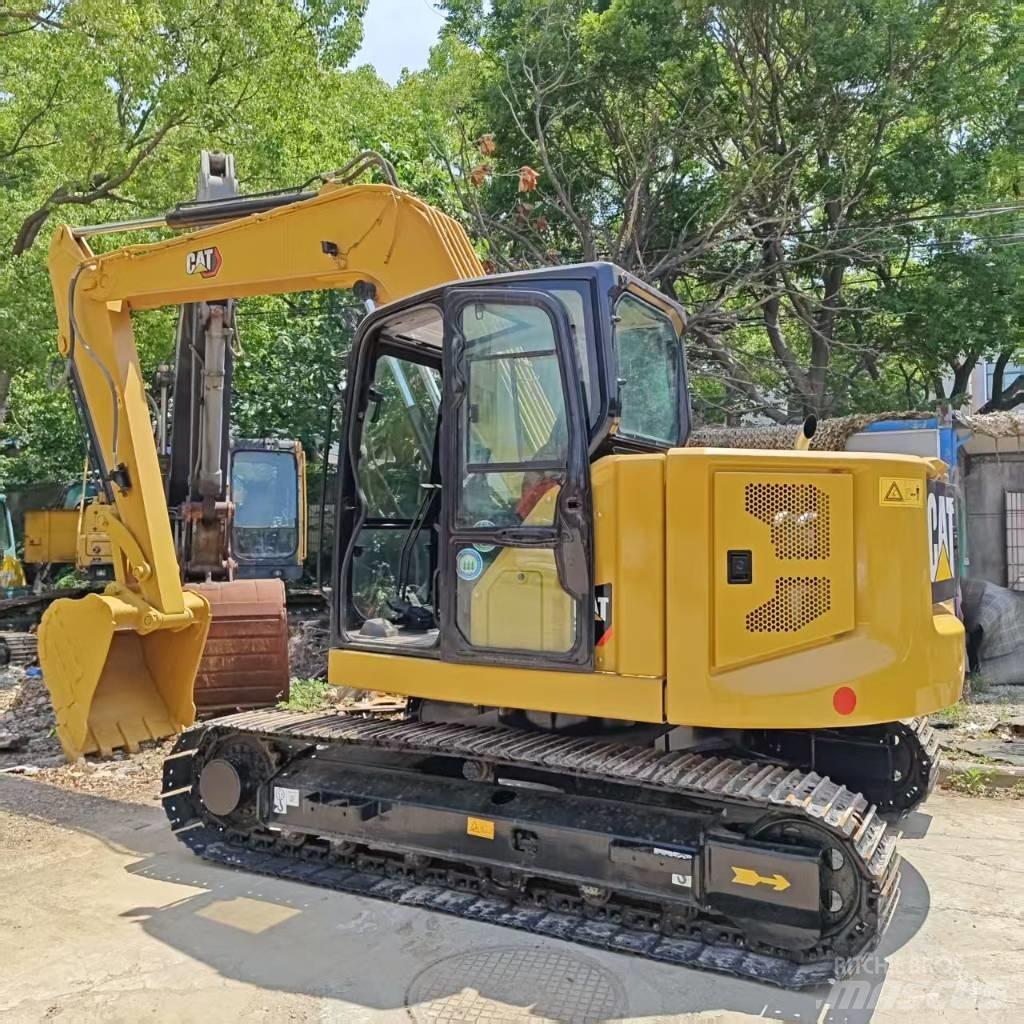CAT 310 Bagri goseničarji