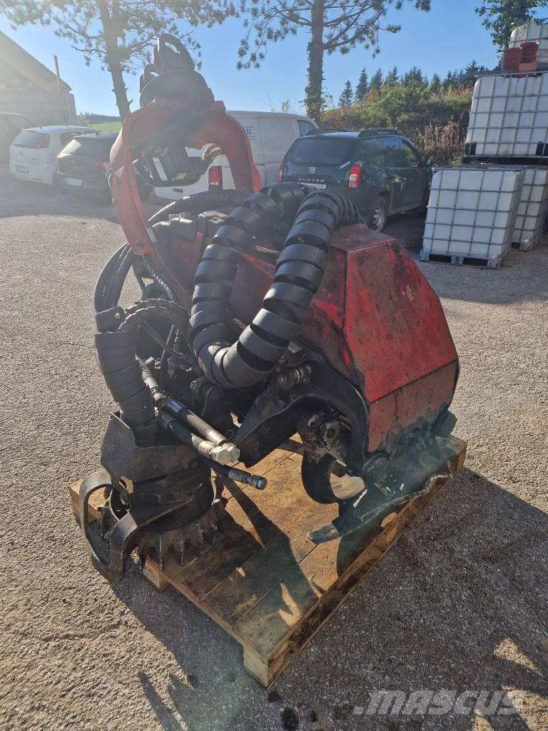Komatsu 124 Stroji za kleščenje