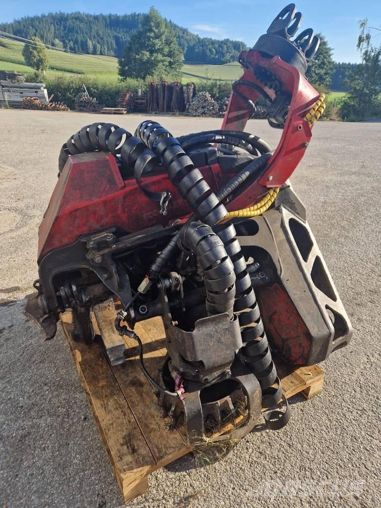 Komatsu 124 Stroji za kleščenje