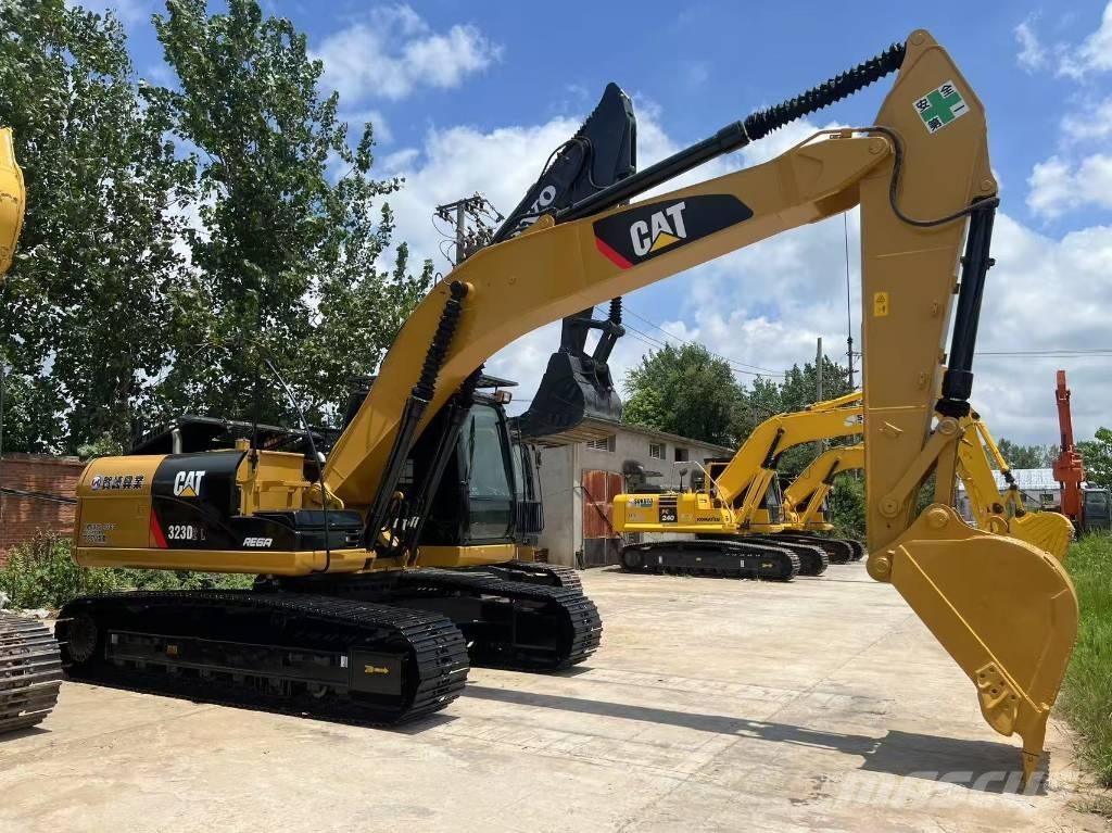 CAT 323d2l Midi bagri 7t – 12t