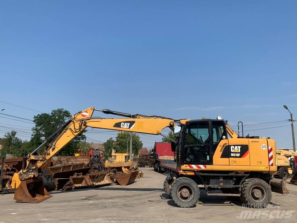 CAT M 318 F Bagri na kolesih