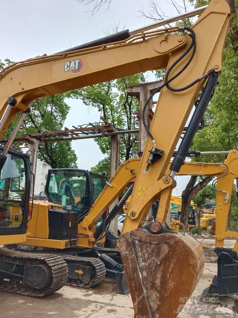 CAT 310 Bagri goseničarji