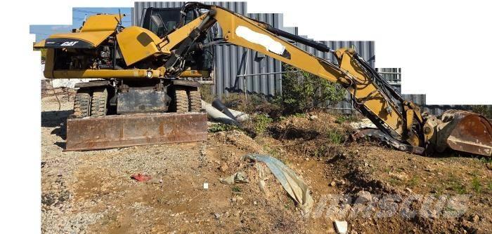 CAT M 313 D Bagri na kolesih
