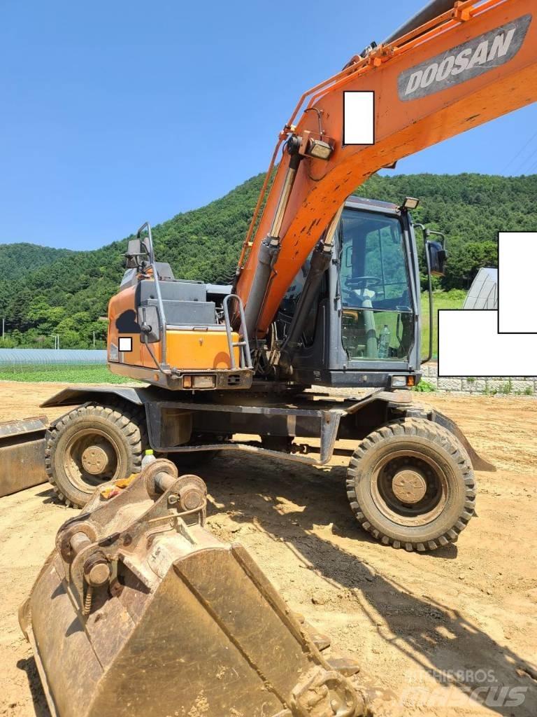 Doosan DX 140 W Bagri na kolesih
