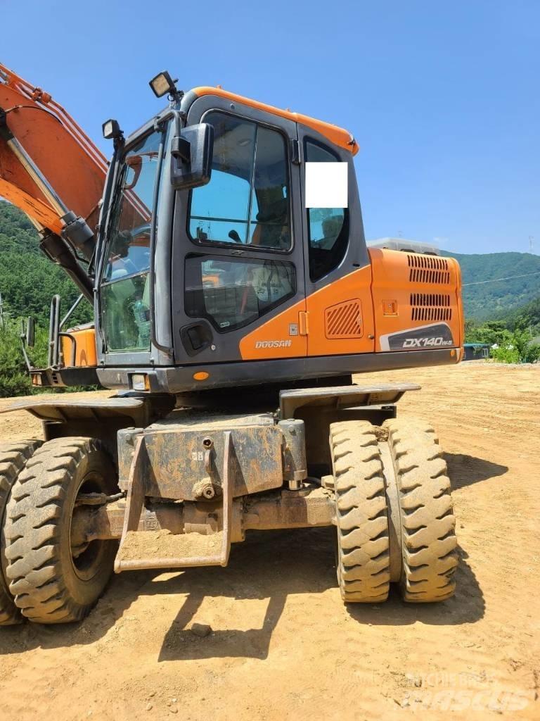 Doosan DX 140 W Bagri na kolesih